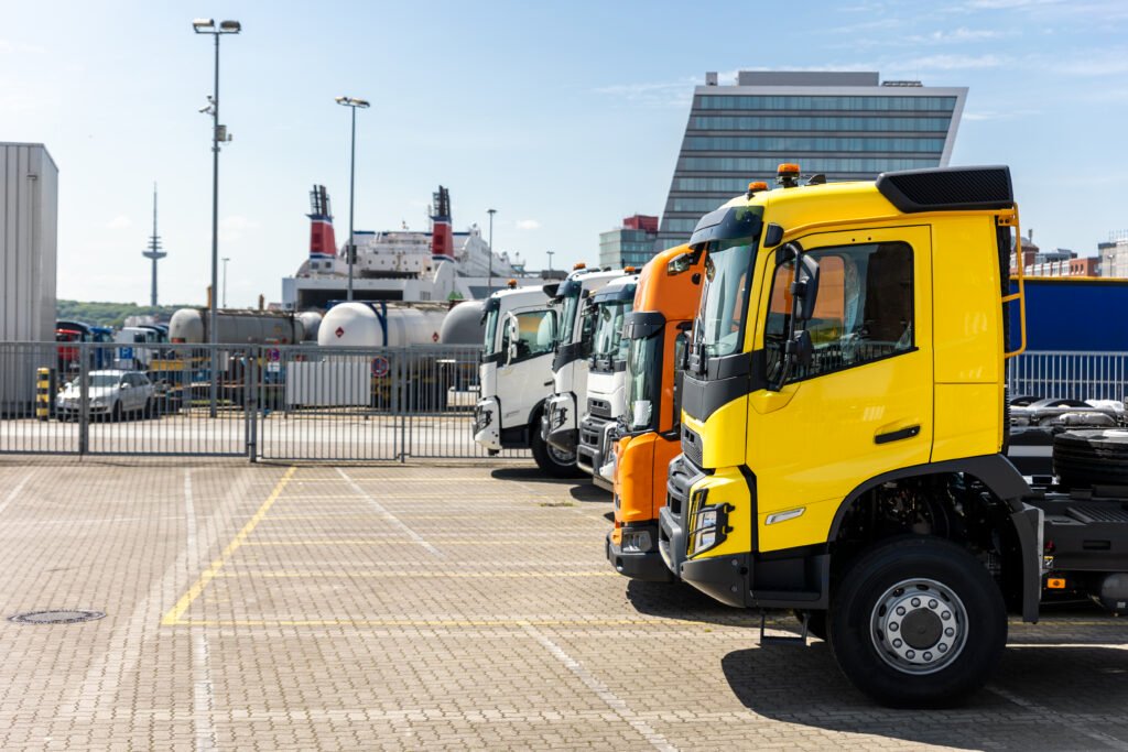 Semi-trucks parked in a commercial lot